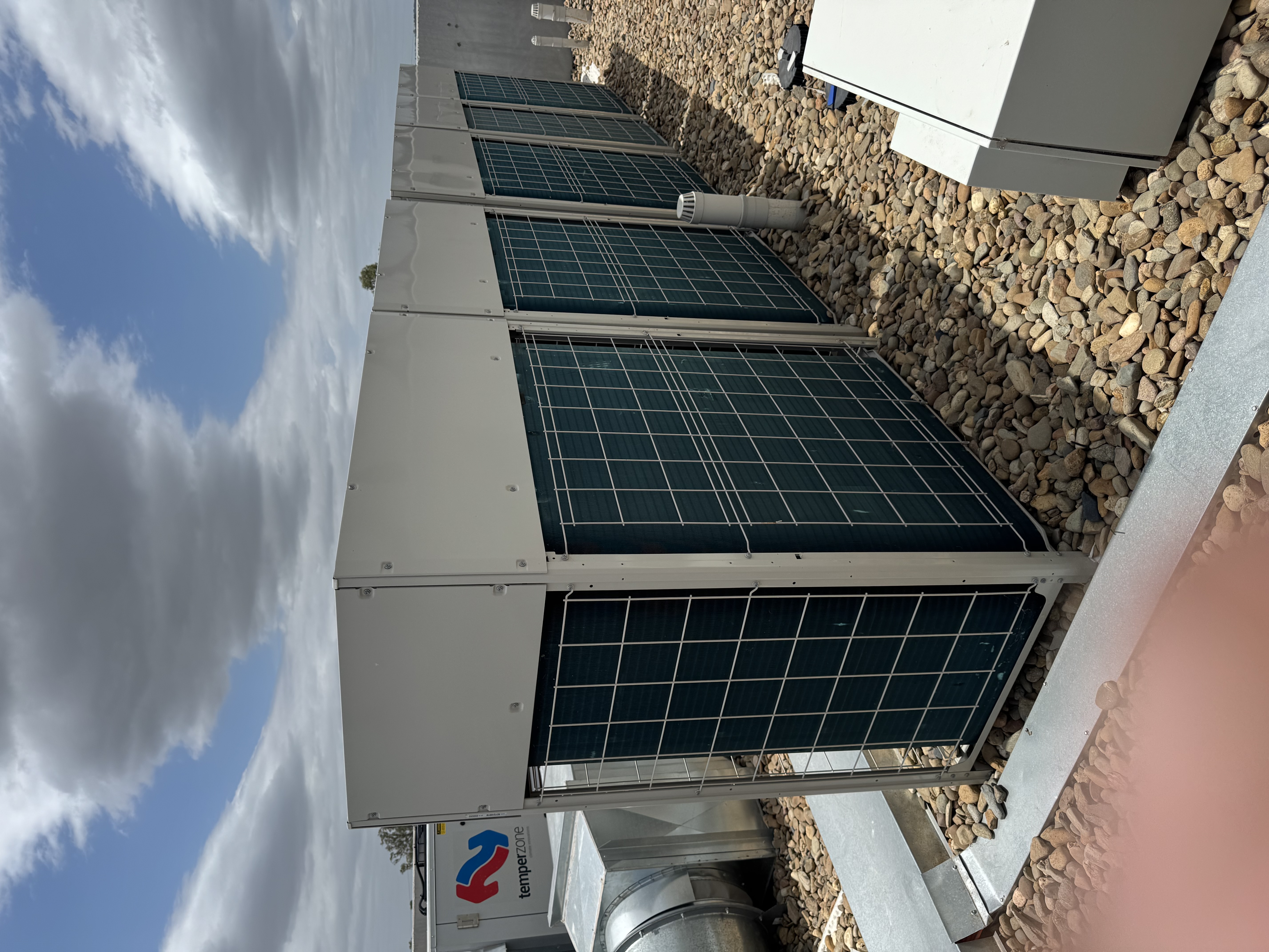 HVAC pre-cooling condenser misting installation